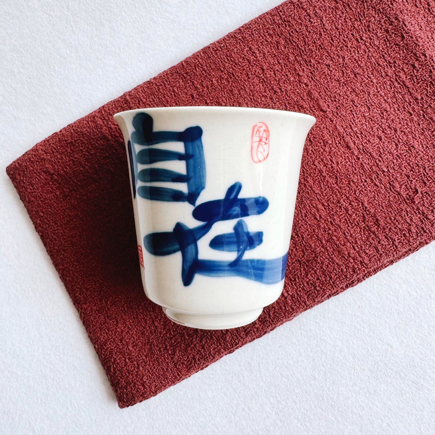 THE CALLIGRAPHY TEACUP "AT EASE"