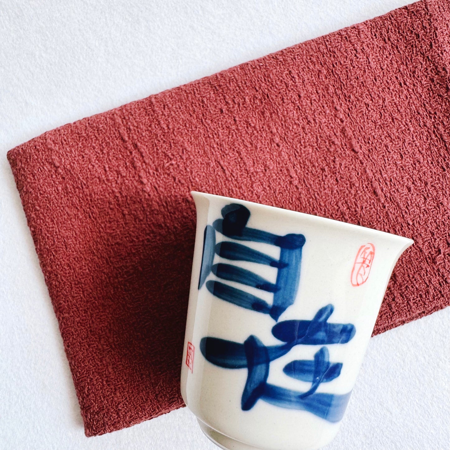 THE CALLIGRAPHY TEACUP "AT EASE"